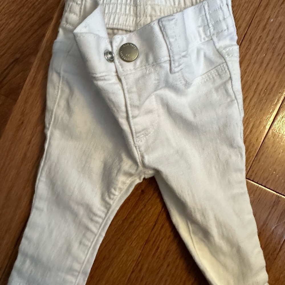 Tiny white jeans.